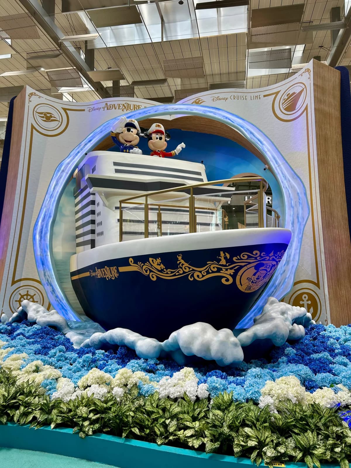Disney Cruise Line 'Disney Adventure' ship display with Captain Mickey and Minnie at Changi Airport