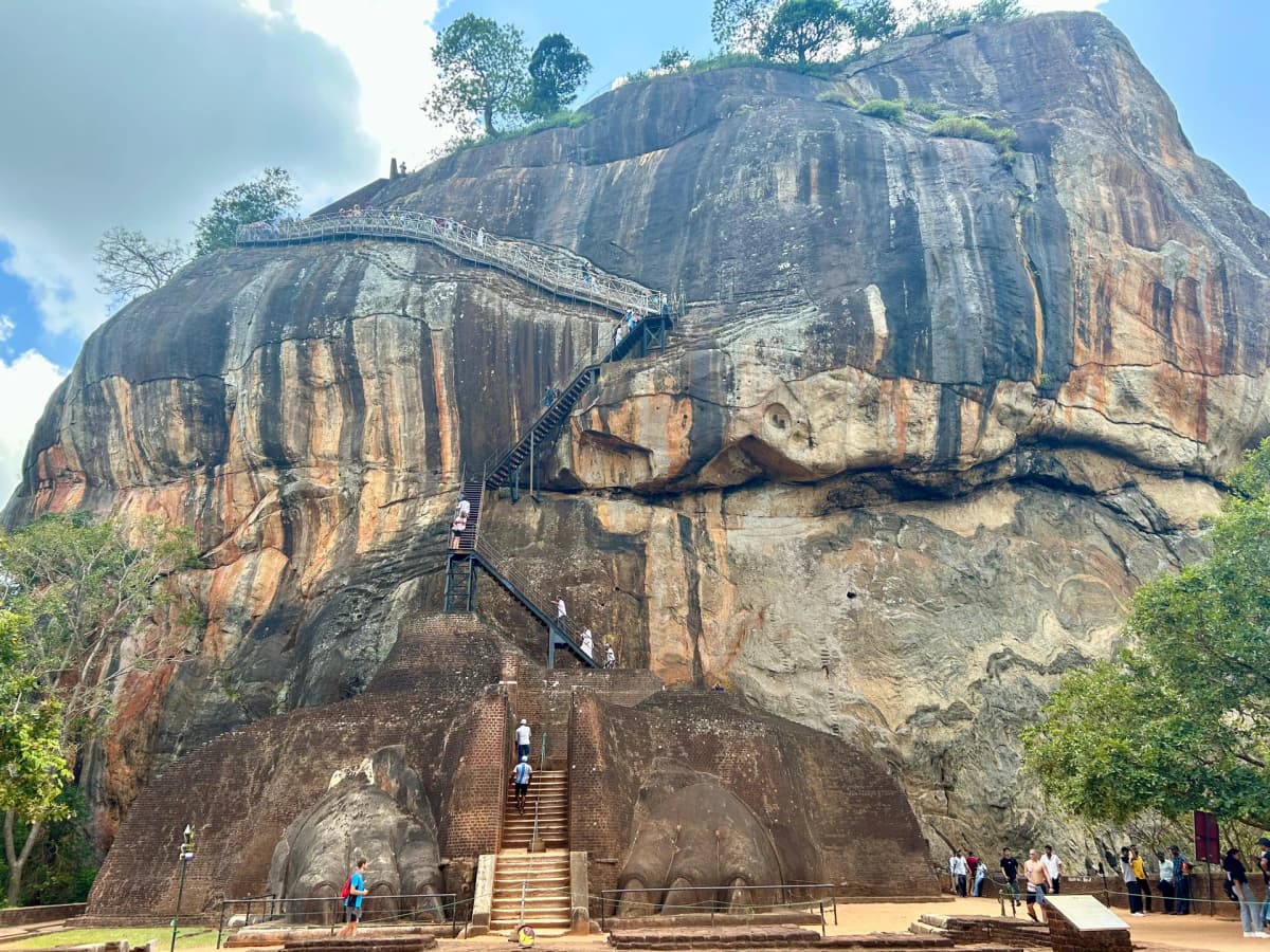 Standing at the imposing Lion Paw terrace before the final climb up Sigiriya